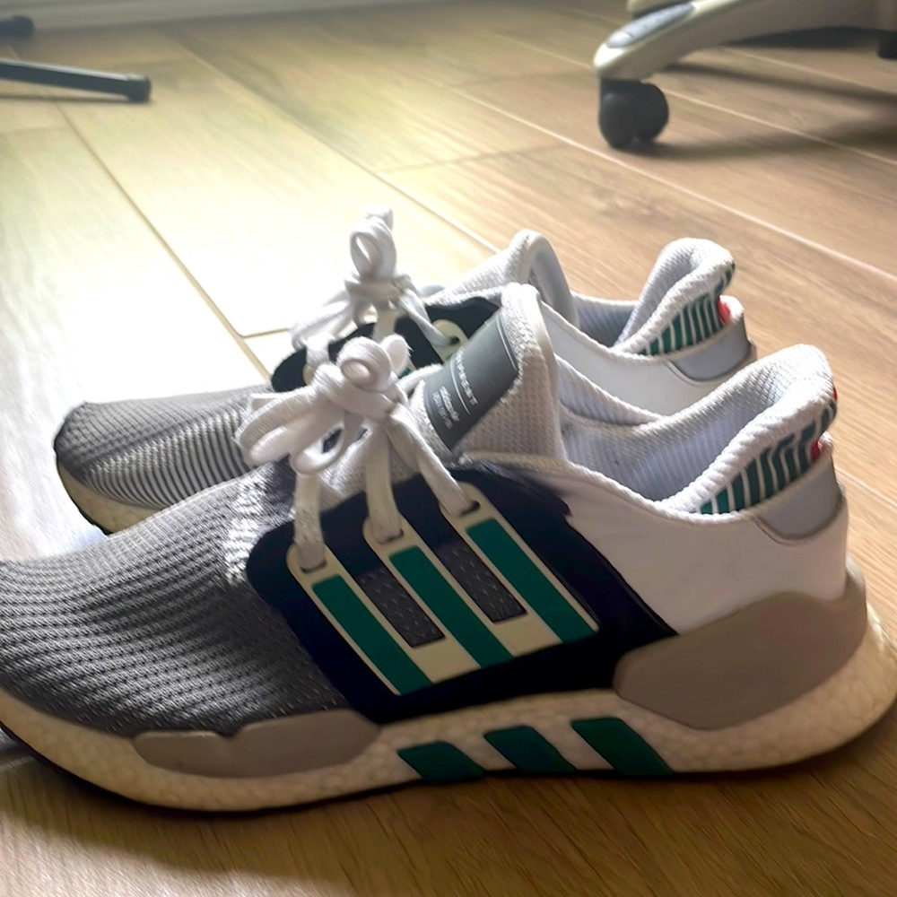 White/Black/Grey And Green worn normal wear.  Bought brand new .